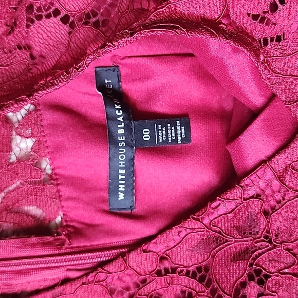 A burgundy lace dress that only wore once. It's in perfect condition. - Picture 3 of 3